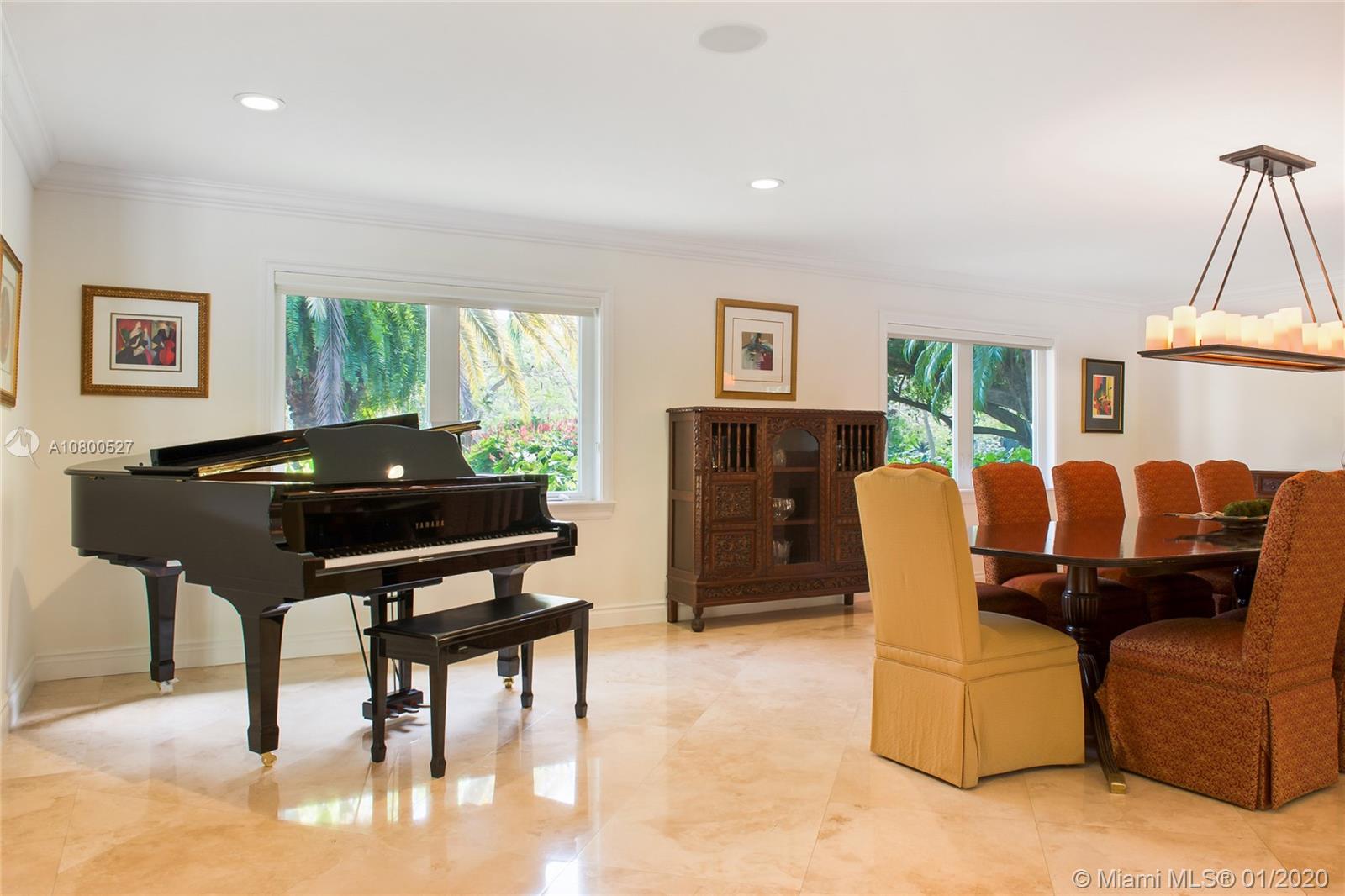 12440 Moss Ranch Road Pinecrest, FL 33156 - Photo 5 of 33 a living room with furniture a piano and a flat screen tv