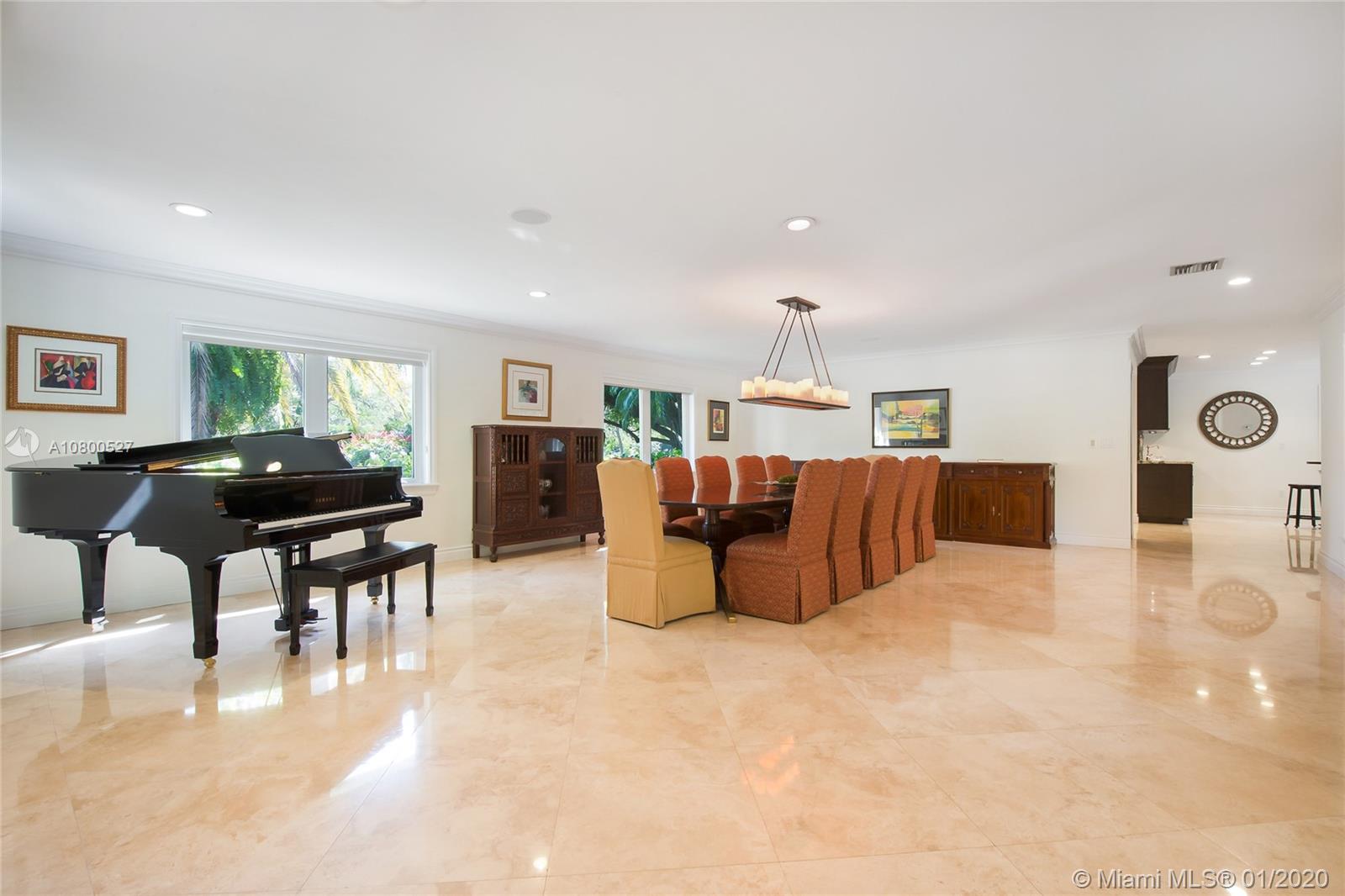 12440 Moss Ranch Road Pinecrest, FL 33156 - Photo 6 of 33 a living room with furniture and kitchen view