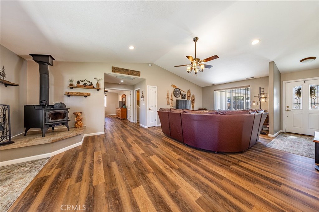 643 Purdy Road Chester, CA 96020 - Photo 4 of 29 a living room with furniture and a chandelier
