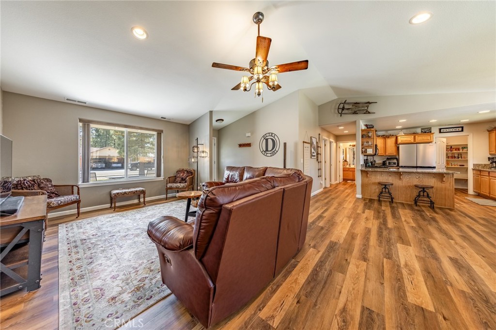 643 Purdy Road Chester, CA 96020 - Photo 5 of 29 a living room with furniture and a wooden floor