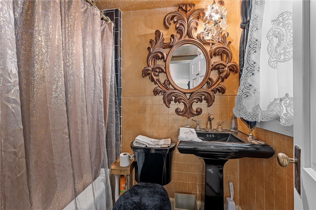 3217 Robin Road Waco, TX 76708 - Photo 49 of 61 a view of a hallway with washer and dryer