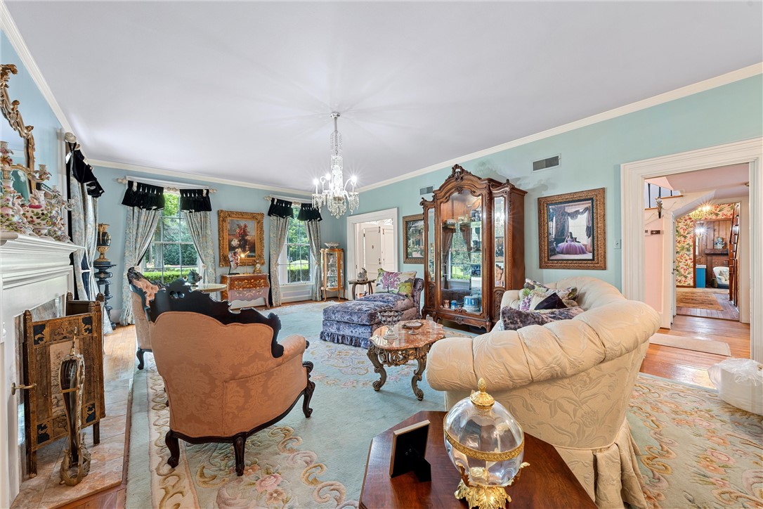 3217 Robin Road Waco, TX 76708 - Photo 59 of 61 a living room with furniture and a chandelier