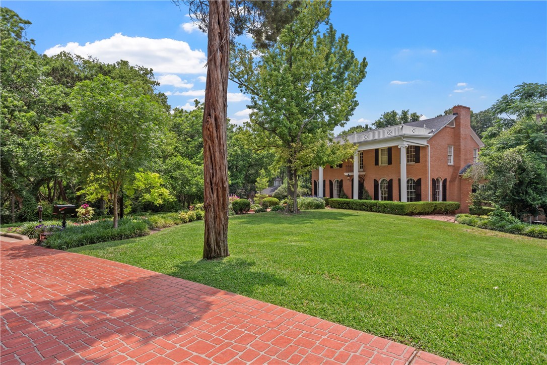 3217 Robin Road Waco, TX 76708 - Photo 7 of 61 a view of a house with a yard