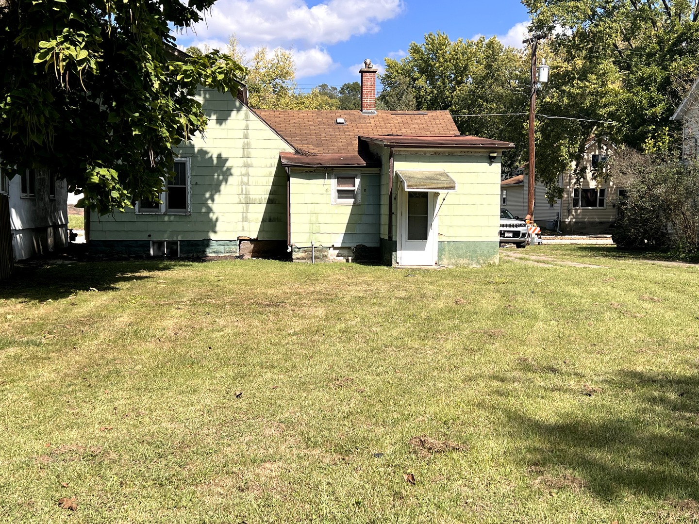454 Ryall Street Marseilles, IL 61341 - Photo 3 of 5 a view of a house with a yard and tree