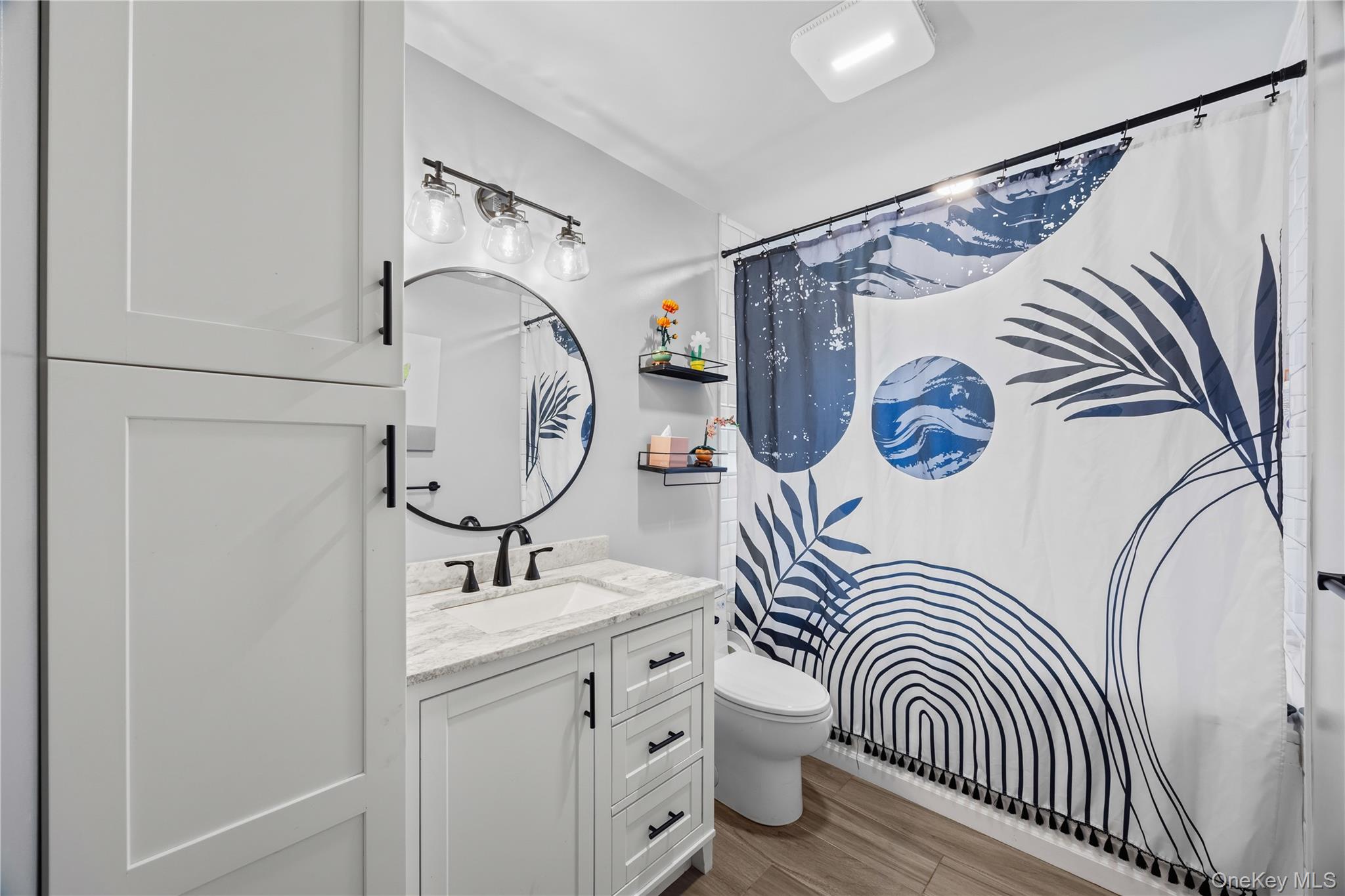 69 Silver Spring Road New Windsor, NY 12553 - Photo 16 of 20 a bathroom with a sink and a mirror