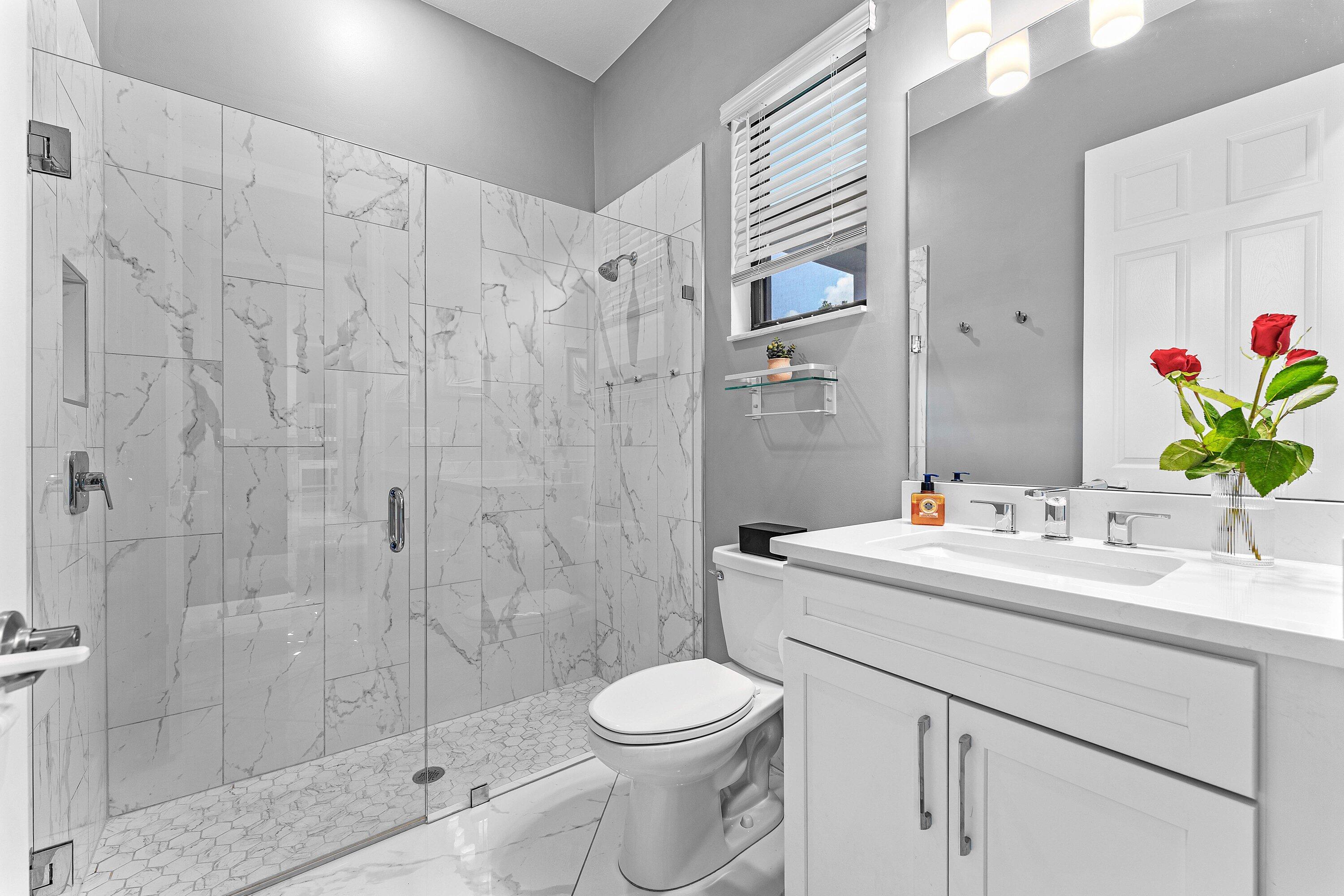1063 Ember Ridge Run Loxahatchee, FL 33470 - Photo 16 of 76 DOWNSTAIRS BATHROOM