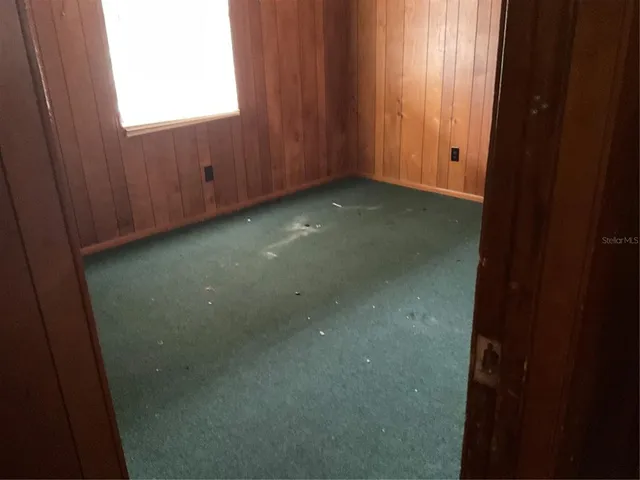 a bathroom with a shower and a toilet