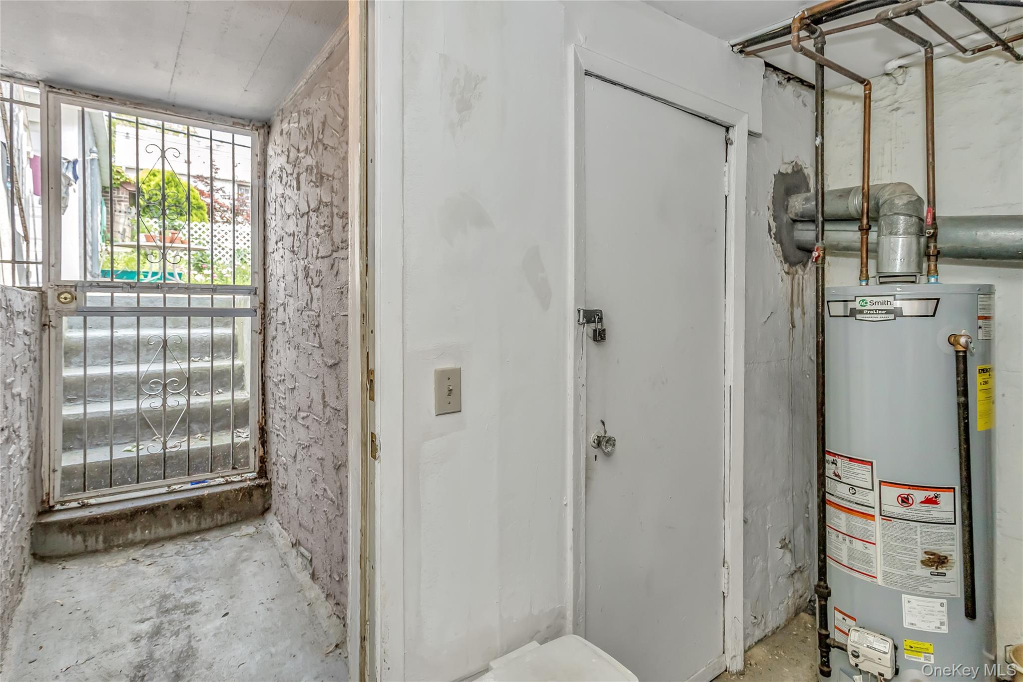 25-41 83rd Street Queens, NY 11370 - Photo 15 of 15 a view of an empty room with a window