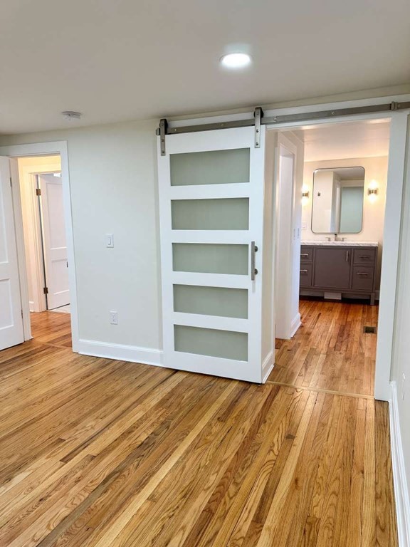 93 Moosehill Road East Walpole, MA 02032 - Photo 12 of 18 a view of a room with wooden floor and closet