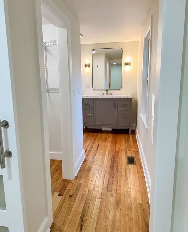 93 Moosehill Road East Walpole, MA 02032 - Photo 13 of 18 a bathroom with a sink and a mirror