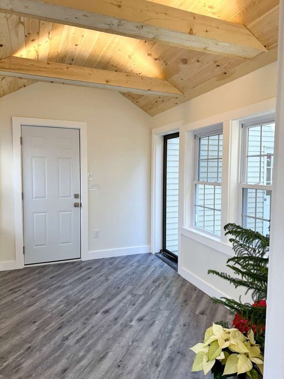 93 Moosehill Road East Walpole, MA 02032 - Photo 10 of 18 a view of an empty room with a window and wooden floor