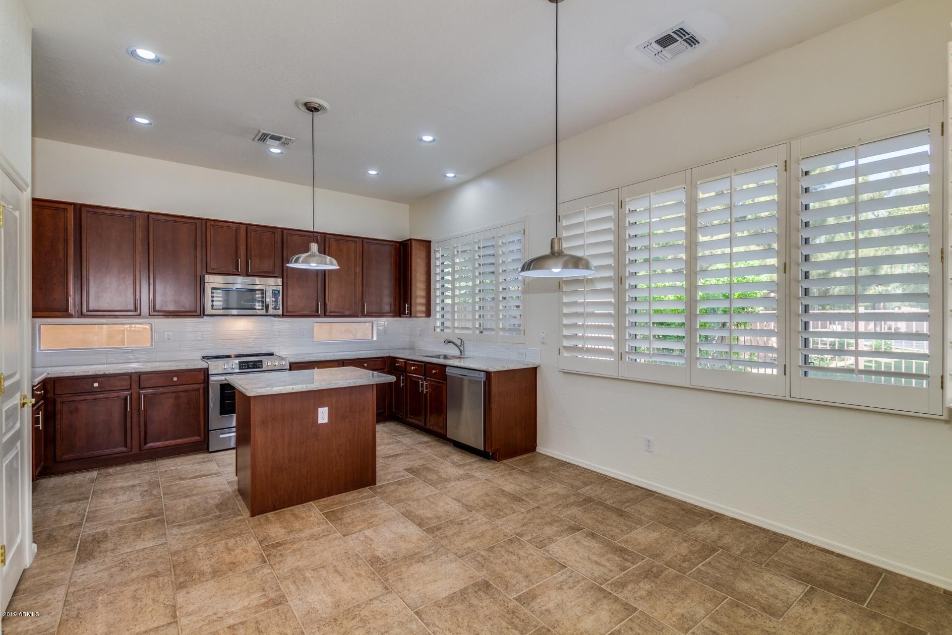 1886 West Periwinkle Way Chandler, AZ 85248 - Photo 7 of 30 Kitchen