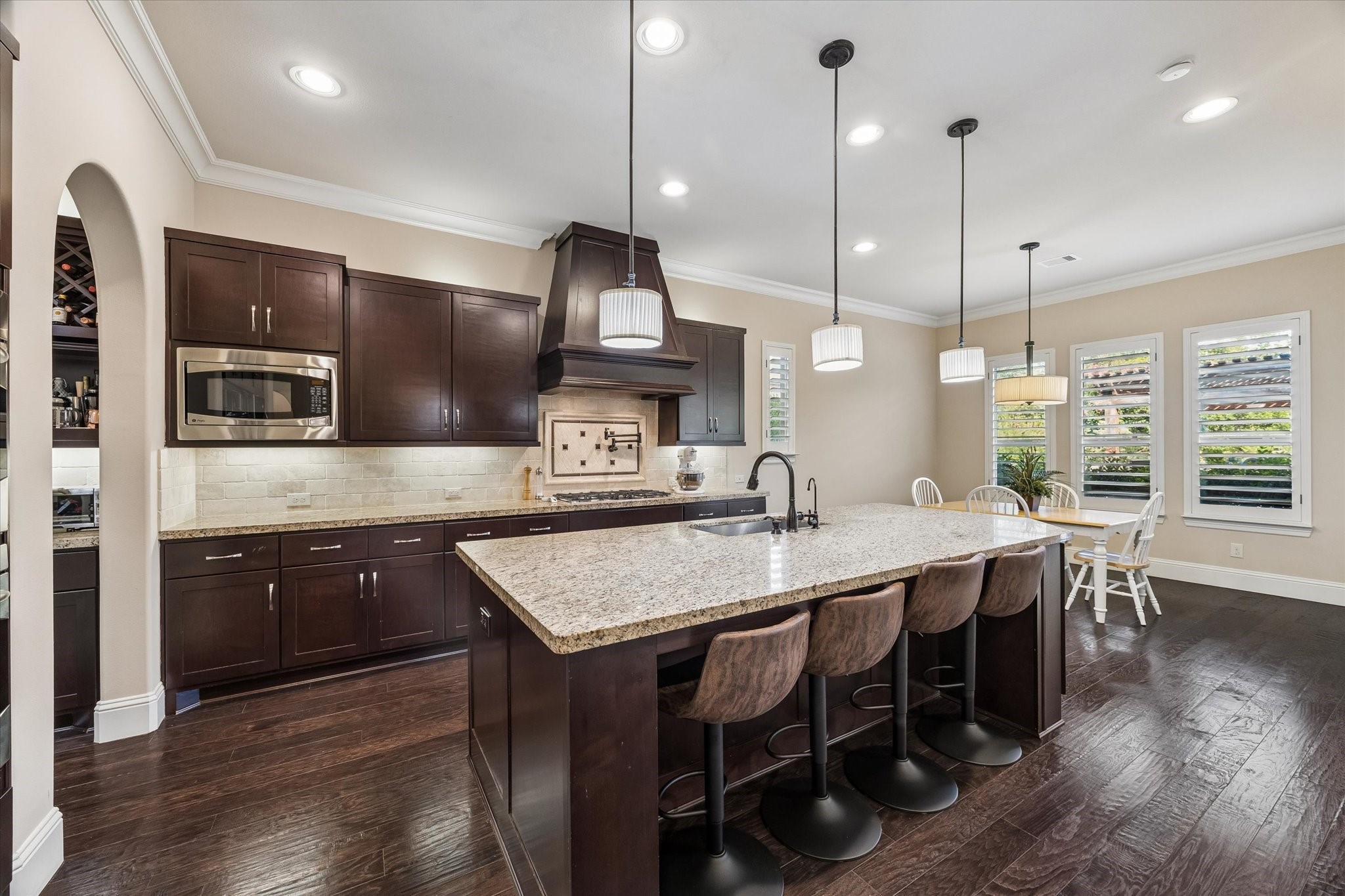 3 Tiburon Court Spring, TX 77389 - Photo 10 of 34 The open design keeps everyone connected. Conversations flow easily from the kitchen to the family room, where laughter mixes with the sound of bacon sizzling and the occasional bark from the family dog, hoping for a dropped bite. No one is in a rush. The day's plans might include a swim, a bike ride through the neighborhood, or friends coming over later, but for now, this is everyone's favorite place to be.