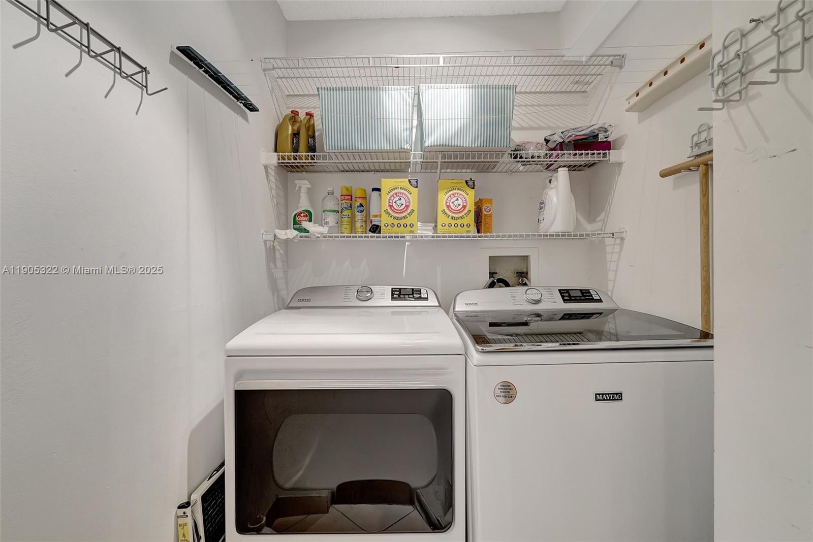 1000 East Island Boulevard, Unit 2004 Aventura, FL 33160 - Photo 34 of 45 a utility room with dryer and washer