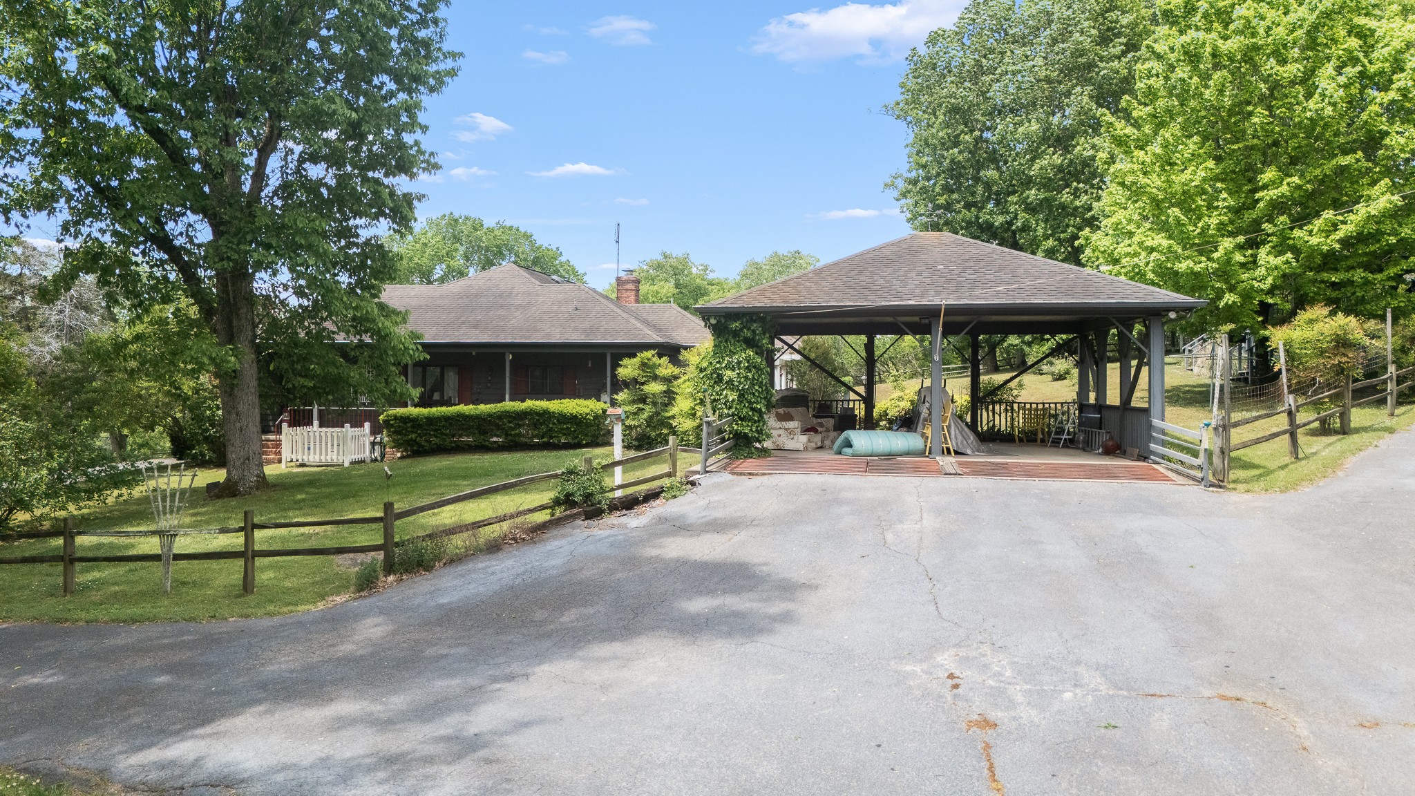 32 Grisham Road Fayetteville, TN 37334 - Photo 13 of 15 a view of a table and chairs under an umbrella