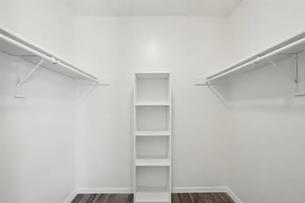 a view of an empty walk in closet