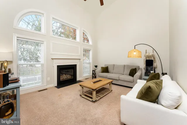 a bathroom with a sink a window and gym equipment