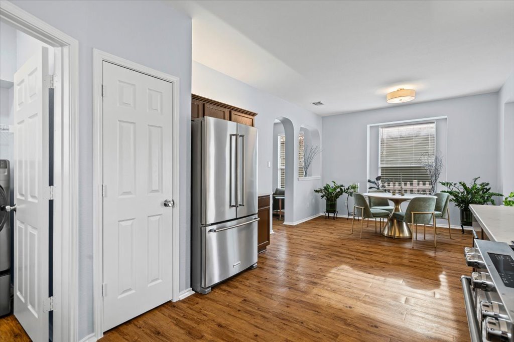 501 Sampson Kyle, TX 78640 - Photo 12 of 31 a view of a livingroom with furniture and a floor to ceiling window