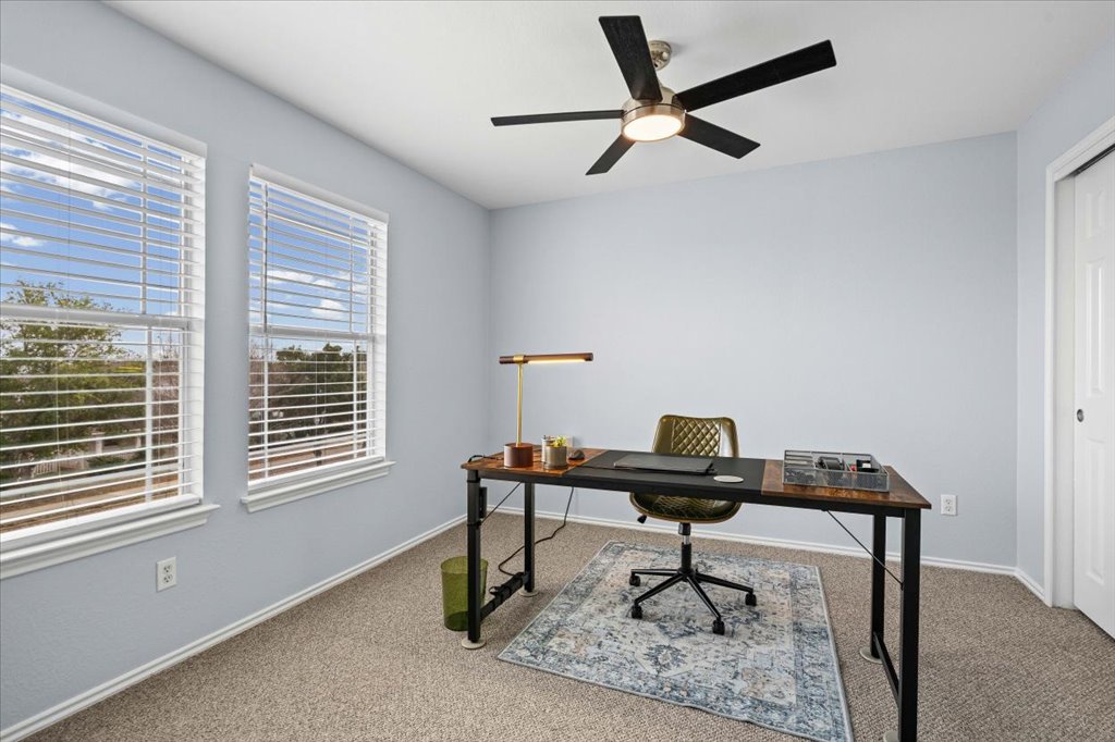 501 Sampson Kyle, TX 78640 - Photo 19 of 31 a view of a workspace with furniture