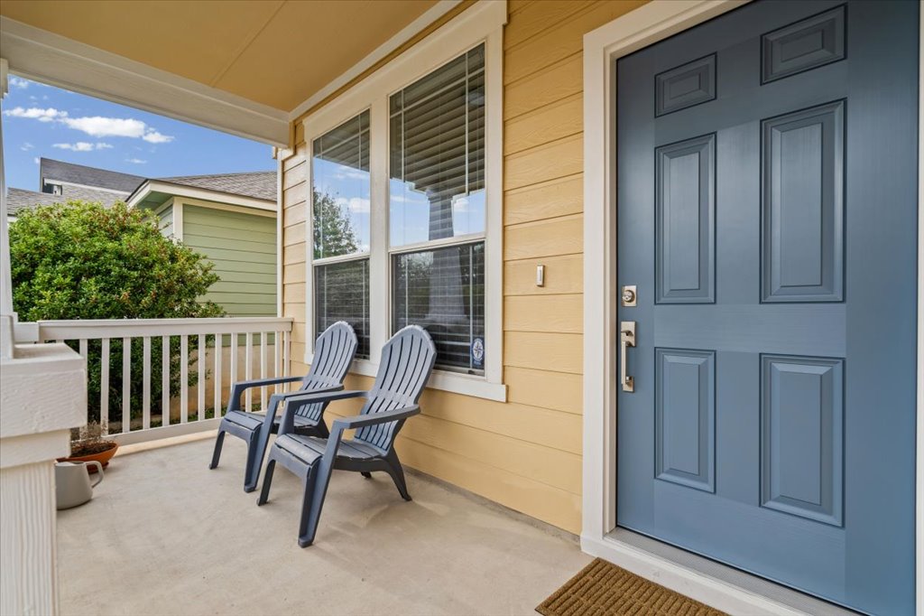 501 Sampson Kyle, TX 78640 - Photo 4 of 31 a view of a two chair in the balcony