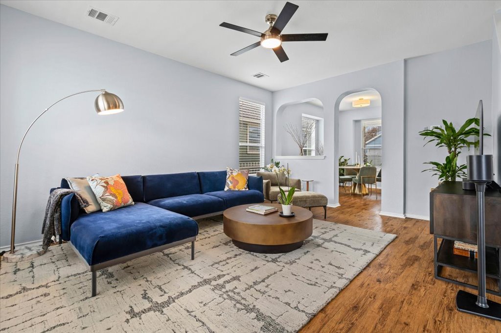 501 Sampson Kyle, TX 78640 - Photo 5 of 31 a living room with furniture and a wooden floor