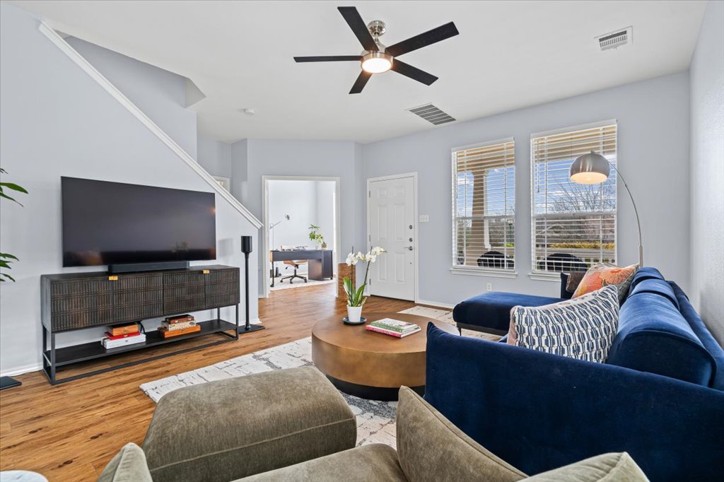 501 Sampson Kyle, TX 78640 - Photo 7 of 31 a living room with furniture and a flat screen tv