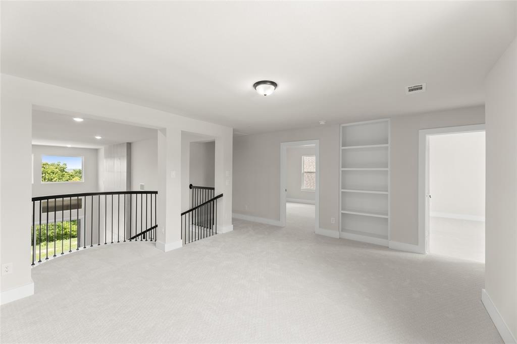 1328 Cash Street Burleson, TX 76028 - Photo 33 of 39 Carpeted spare room with visible vents and baseboards