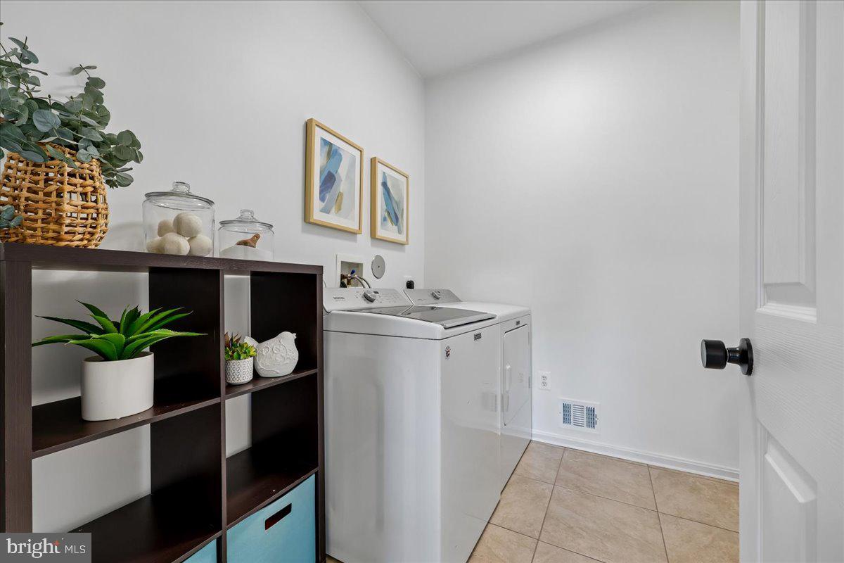 107 Redcloud Court Frederick, MD 21702 - Photo 26 of 78 Bright and functional laundry space.