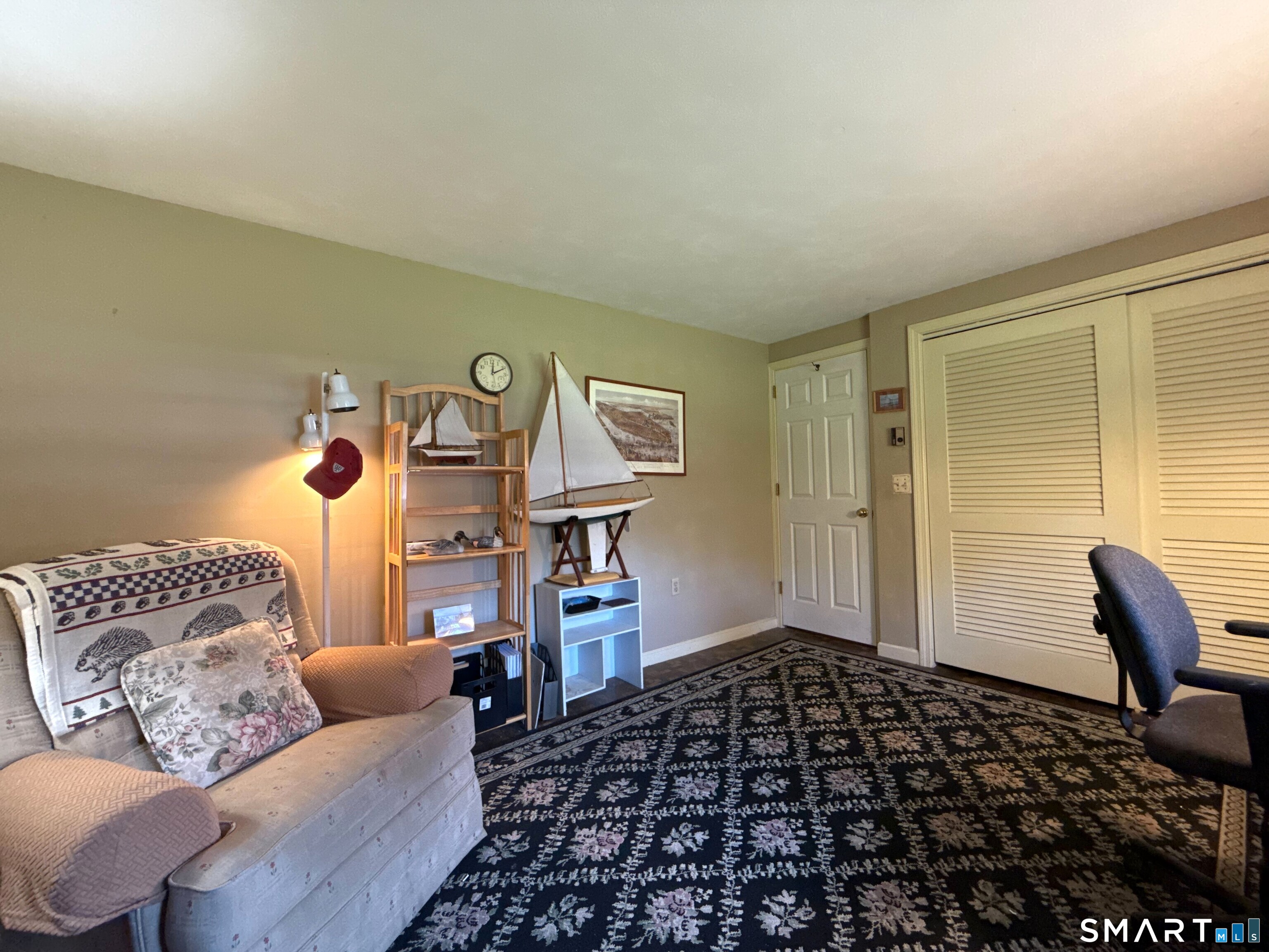 15 Grove Street Deep River, CT 06417 - Photo 20 of 25 a living room with furniture and a window