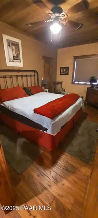 a bathroom with a sink vanity mirror and toilet