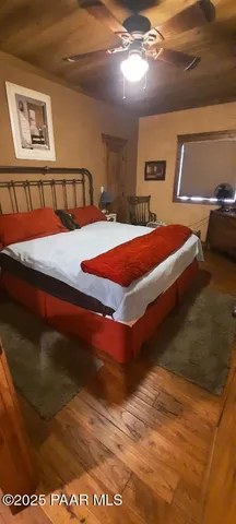 a bathroom with a sink vanity mirror and toilet