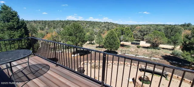 a view of a terrace with chairs