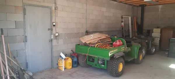 a view of a house with a small backyard