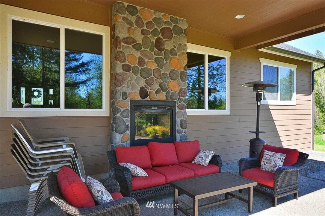 19930 Bear View Lane Southwest Rochester, WA 98579 - Photo 18 of 25 a living room with furniture and a window