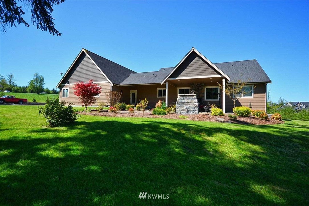 19930 Bear View Lane Southwest Rochester, WA 98579 - Photo 21 of 25 a front view of a house with garden