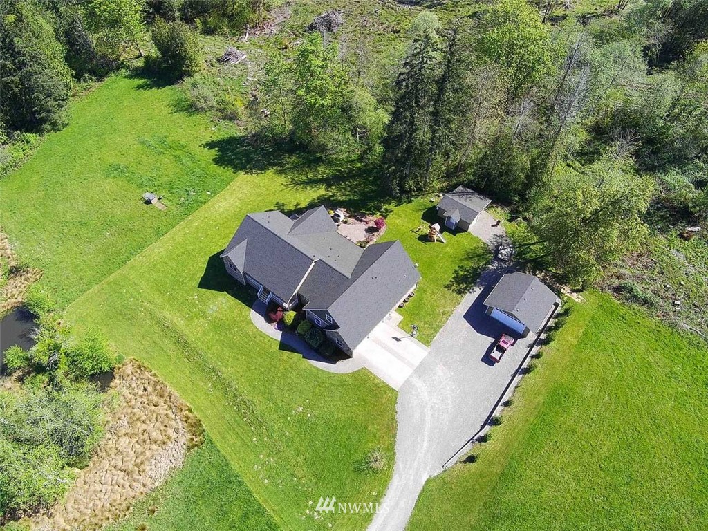 19930 Bear View Lane Southwest Rochester, WA 98579 - Photo 24 of 25 an aerial view of a house with garden space and street view