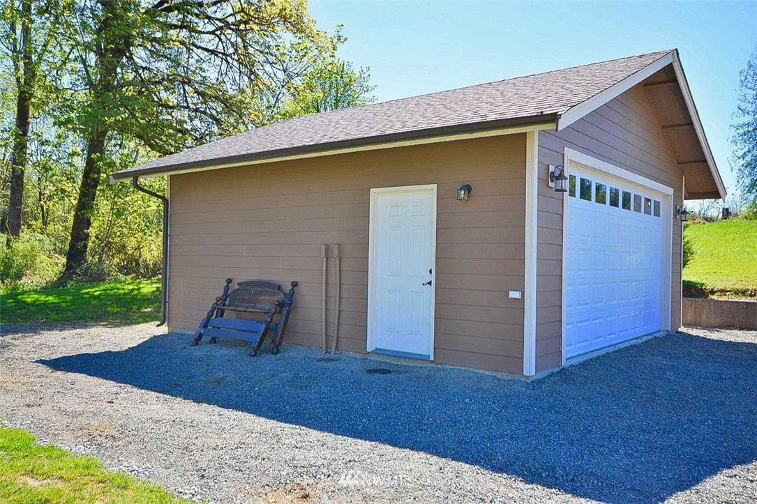 19930 Bear View Lane Southwest Rochester, WA 98579 - Photo 25 of 25 a backyard of a house with seating space