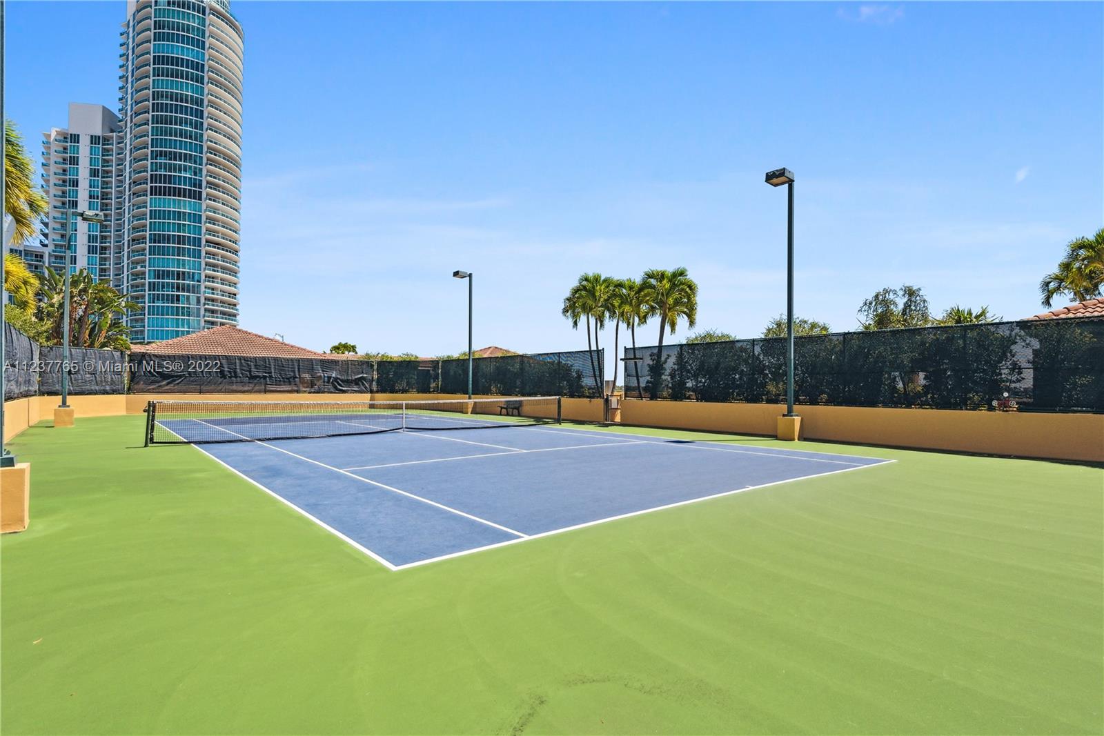 90 Alton Road, Unit TH8 Miami Beach, FL 33139 - Photo 25 of 25 a view of a tennis court