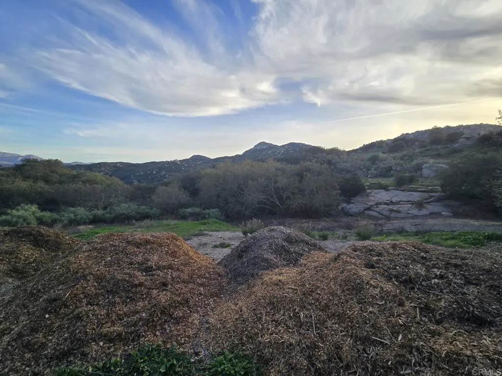 a view of an outdoor space and mountains