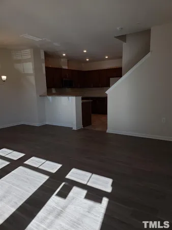 a view of kitchen with wooden floor
