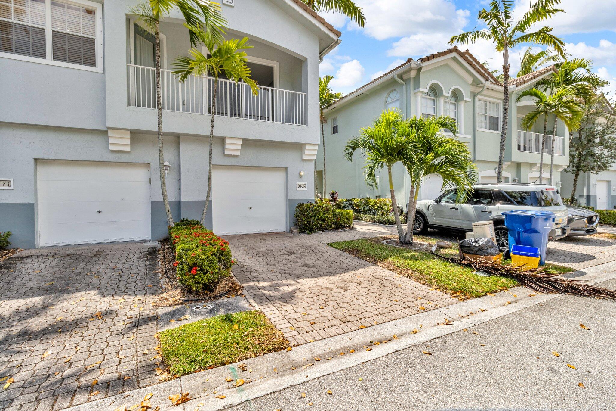 3169 Laurel Ridge Circle Riviera Beach, FL 33404 - Photo 1 of 33 Garage View