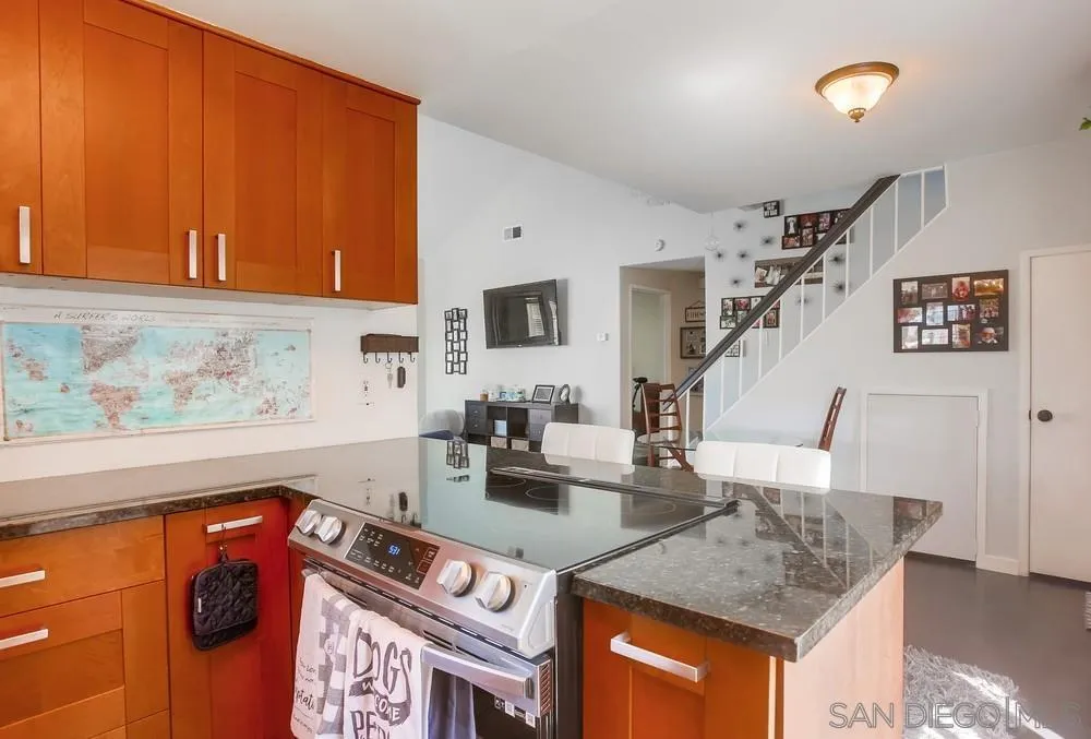 344 Riverview Way Oceanside, CA 92057 - Photo 12 of 41 a living room with furniture a flat screen tv and a sink