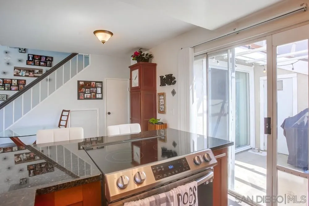 344 Riverview Way Oceanside, CA 92057 - Photo 13 of 41 a living room with furniture and a large window
