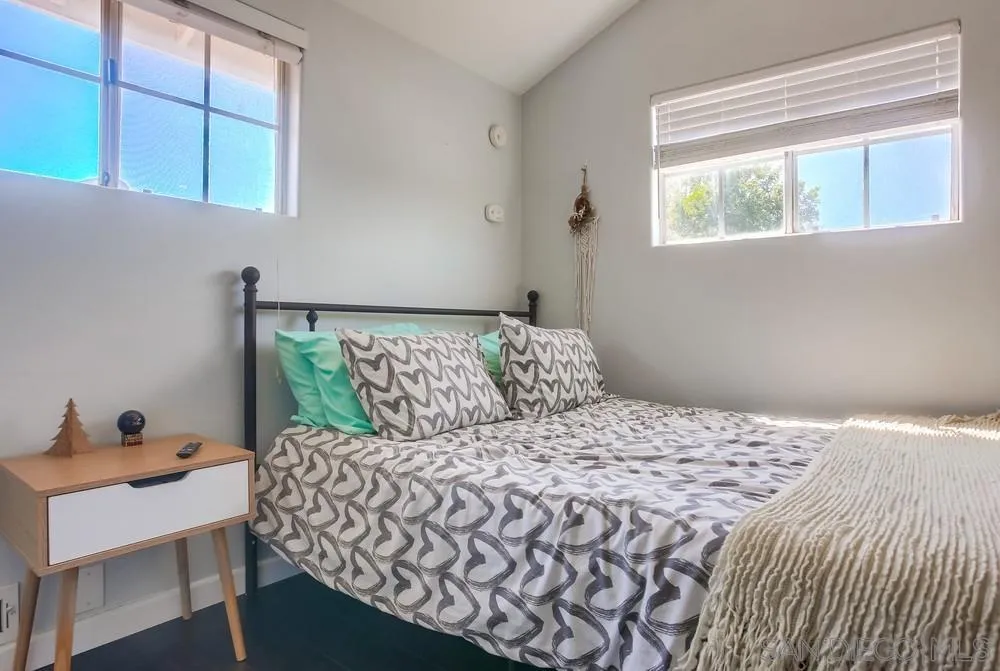 344 Riverview Way Oceanside, CA 92057 - Photo 17 of 41 a bedroom with a bed and a window