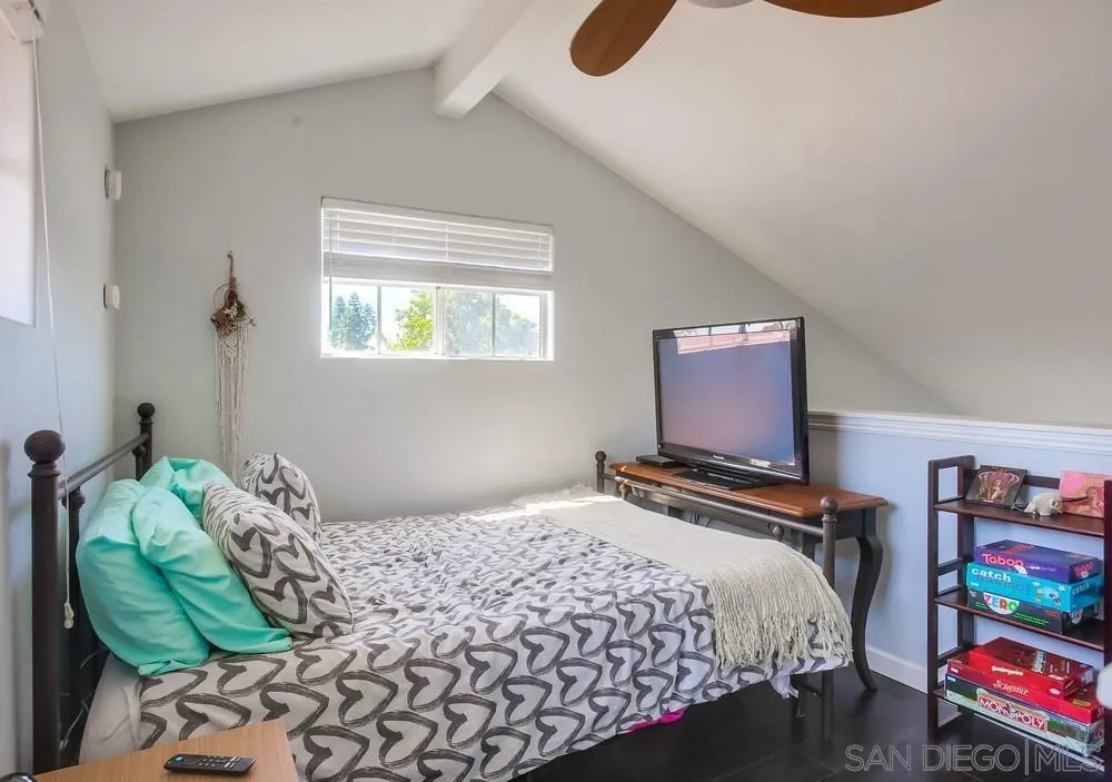 344 Riverview Way Oceanside, CA 92057 - Photo 18 of 41 a bedroom with a bed and a painting on the wall