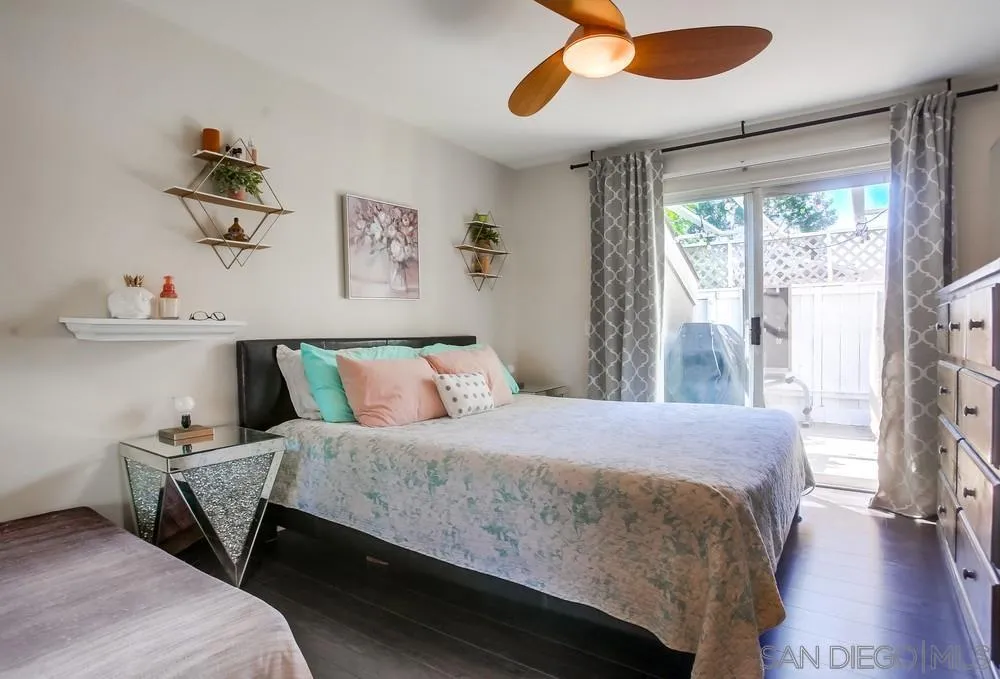 344 Riverview Way Oceanside, CA 92057 - Photo 19 of 41 a bedroom with a bed and a window