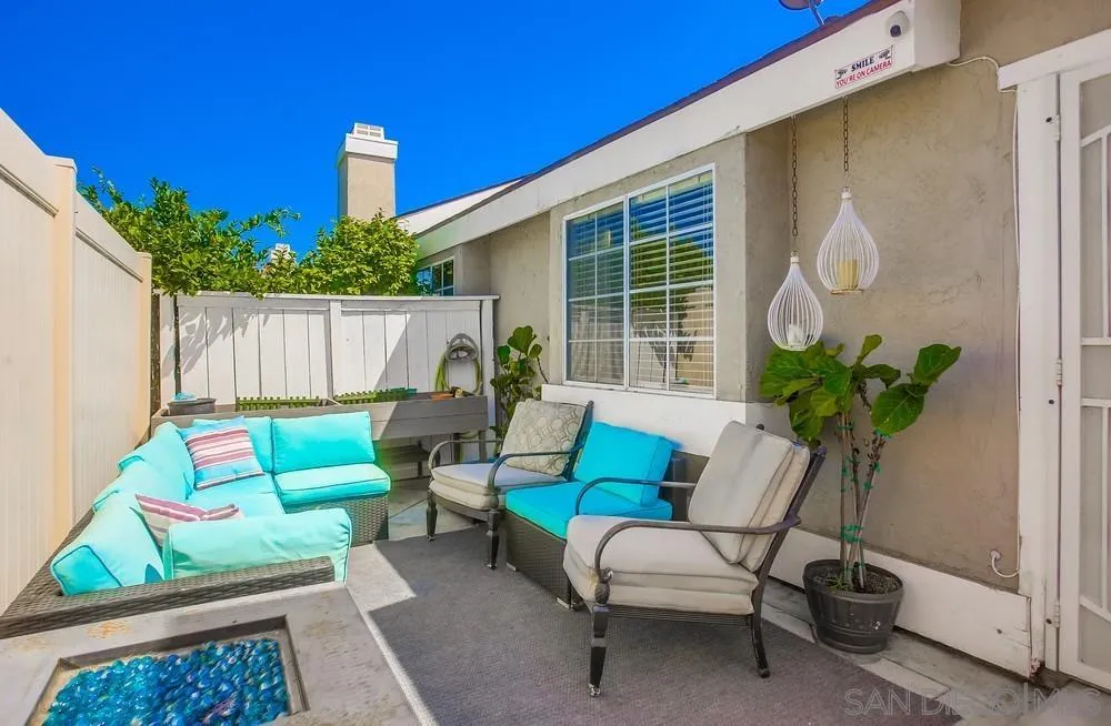344 Riverview Way Oceanside, CA 92057 - Photo 34 of 41 a view of backyard with seating space and potted plants