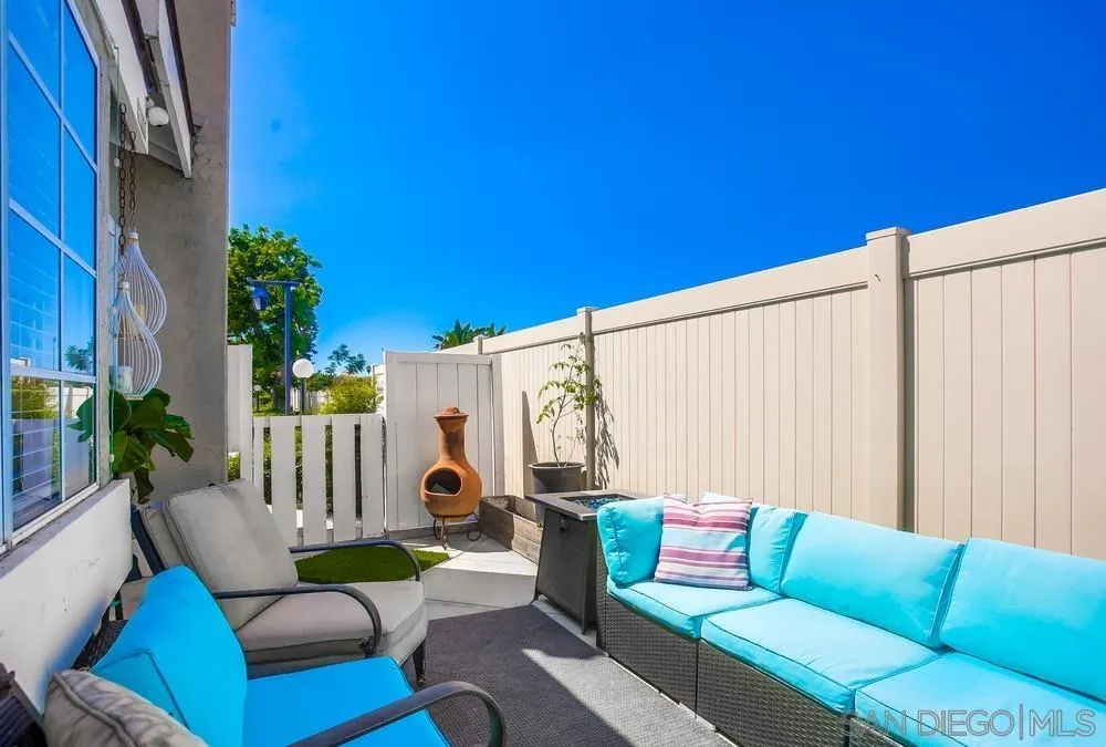 344 Riverview Way Oceanside, CA 92057 - Photo 36 of 41 a view of a patio with couches and a potted plant on a table