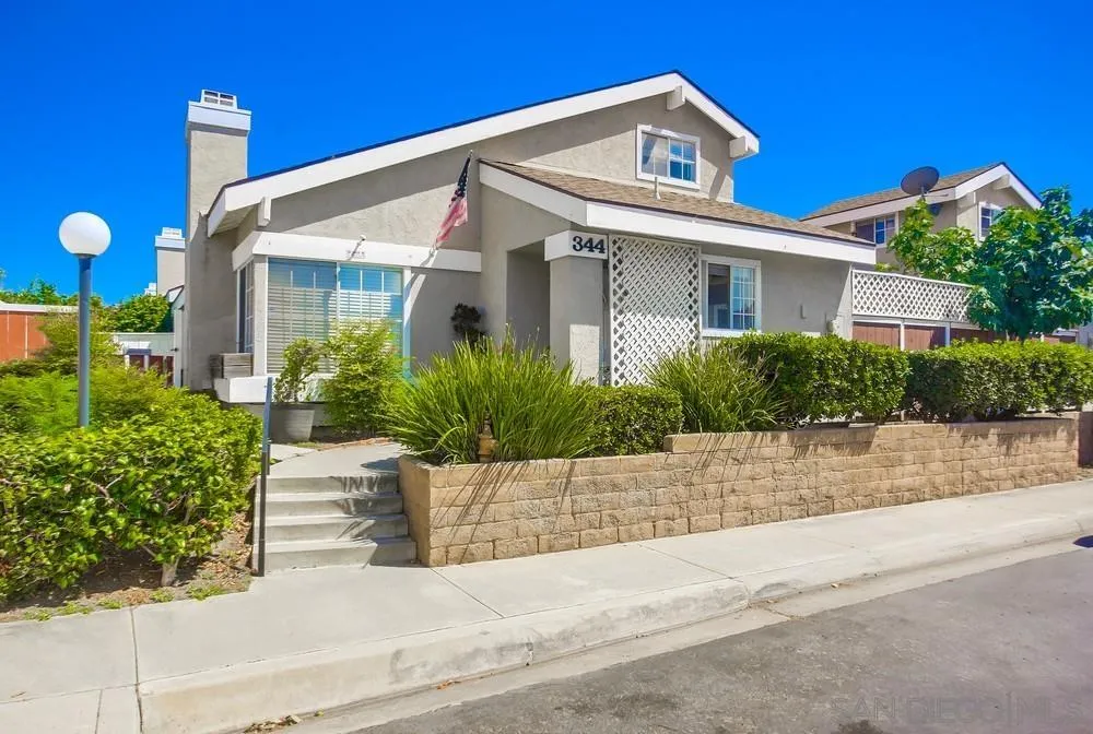 344 Riverview Way Oceanside, CA 92057 - Photo 40 of 41 a front view of a house with a yard