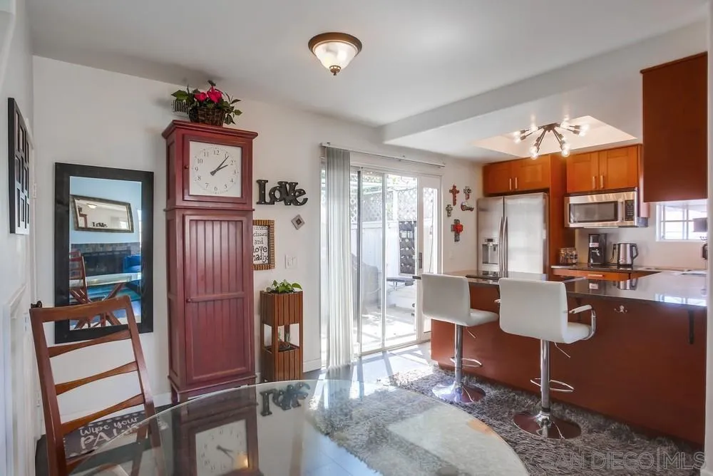 344 Riverview Way Oceanside, CA 92057 - Photo 8 of 41 a living room with furniture a desk and chair with wooden floor